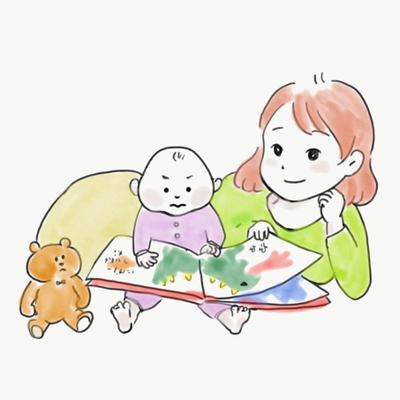 赤ちゃんに読み聞かせするお母さん