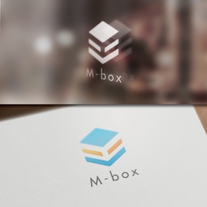 late_design ()さんの「M-Box」のロゴ作成への提案