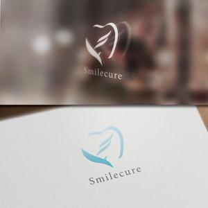 late_design ()さんの歯のホワイトニング商材名「smile cure（スマイルキュア）」のロゴへの提案