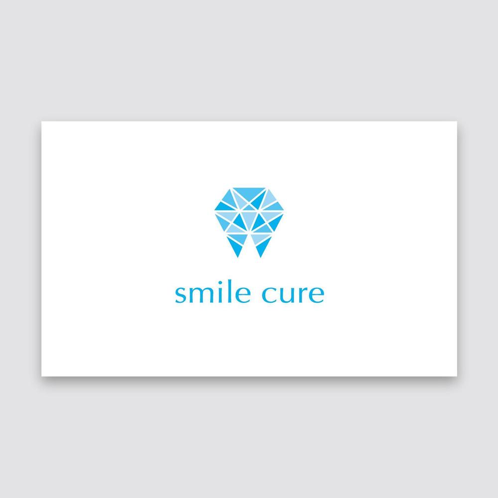 歯のホワイトニング商材名「smile cure（スマイルキュア）」のロゴ