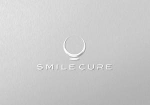 ALTAGRAPH (ALTAGRAPH)さんの歯のホワイトニング商材名「smile cure（スマイルキュア）」のロゴへの提案