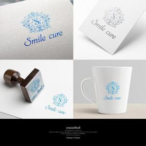 onesize fit’s all (onesizefitsall)さんの歯のホワイトニング商材名「smile cure（スマイルキュア）」のロゴへの提案