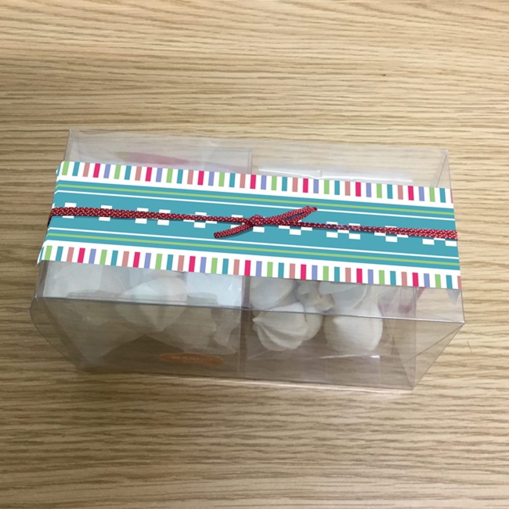 沖縄土産の焼菓子箱の帯紙デザイン