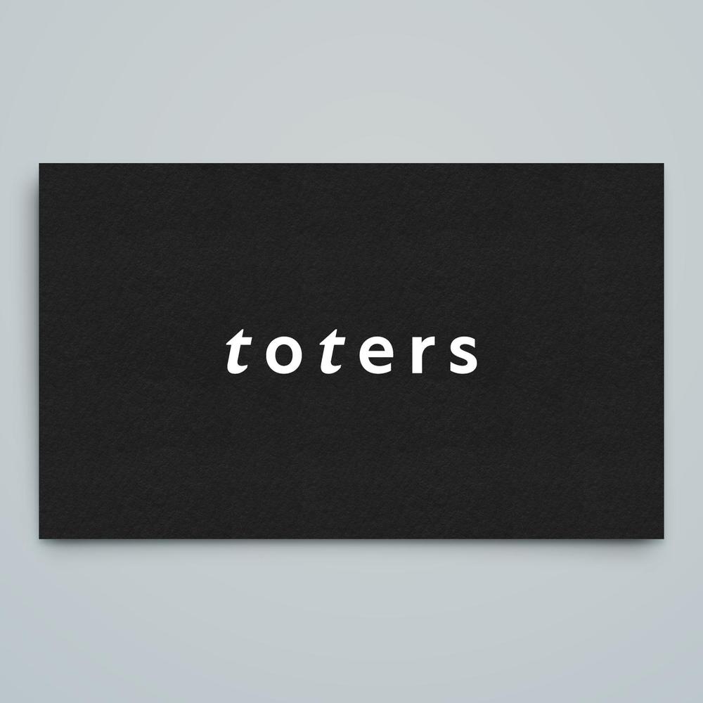 トートバッグ、Tシャツ、ポロシャツ等のブランド「toters」のロゴ