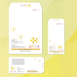 iconograph (nhgraph)さんの介護運営会社の封筒デザインへの提案