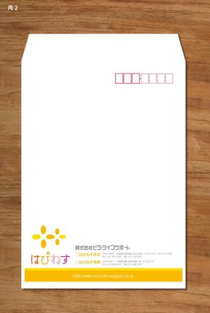 morris (morris_design)さんの介護運営会社の封筒デザインへの提案