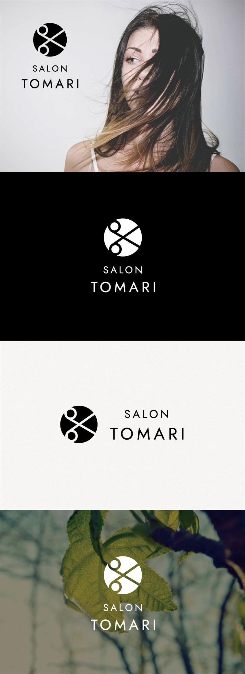 理容店「SALON TOMARI」のロゴ