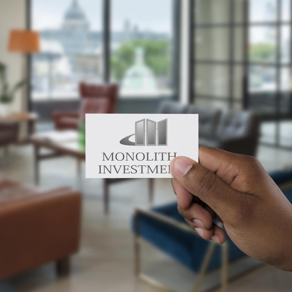 新規会社 不動産 賃貸 経営 MONOLITH INVESTMENT のロゴ