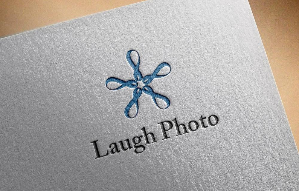 フォトオフィスの「Laugh Photo」のロゴ