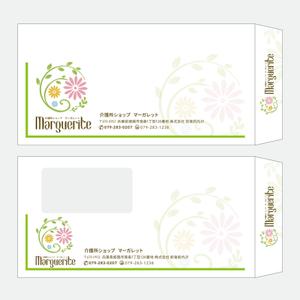 Design co.que (coque0033)さんの新会社「介護ショップ マーガレット」の封筒デザインへの提案