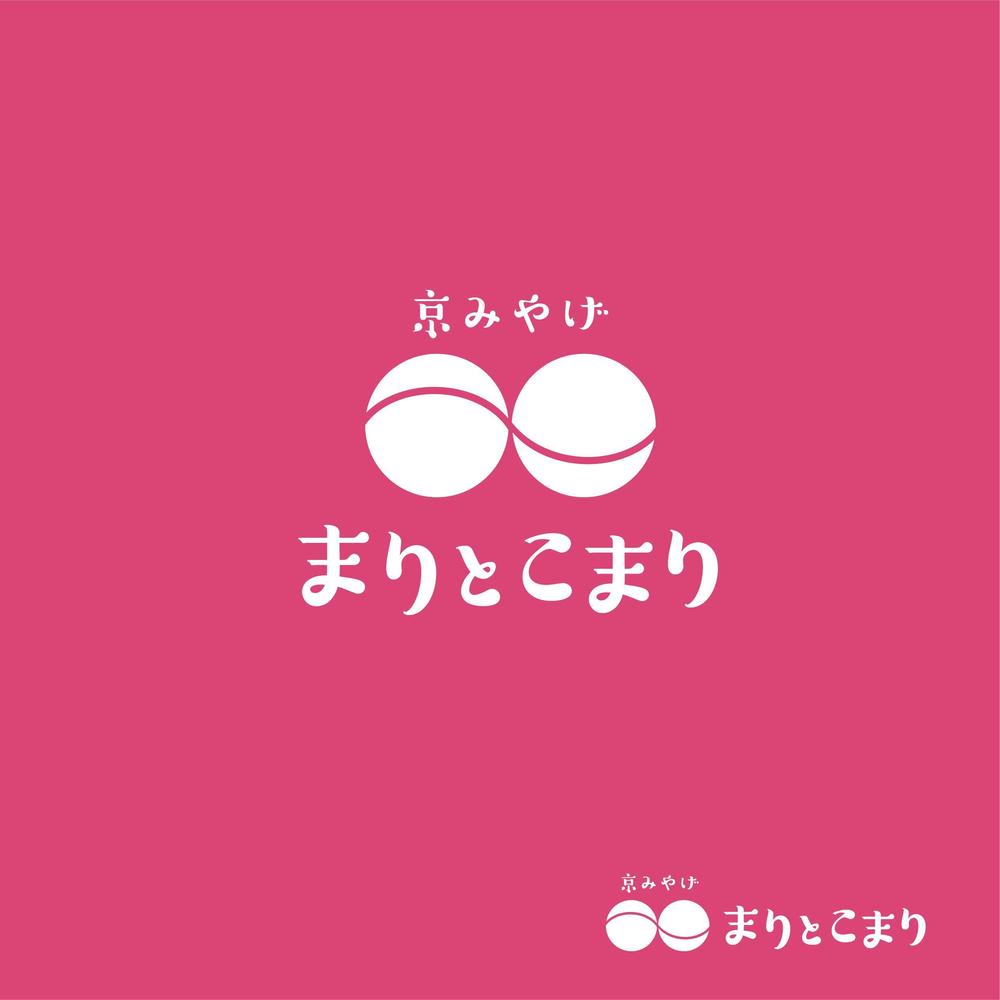 おみやげショップ｢まりとこまり｣のロゴ