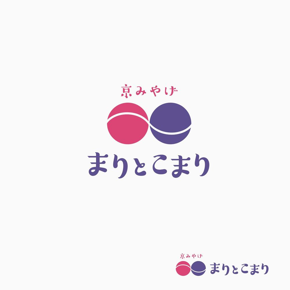 おみやげショップ｢まりとこまり｣のロゴ