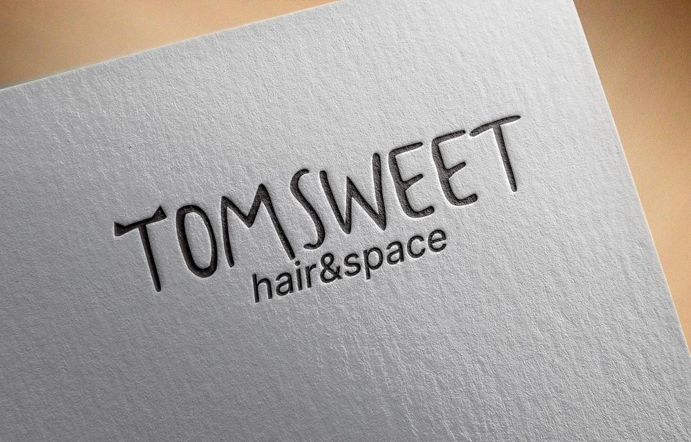 美容室「TOMSWEET」（読み:トムスウィート）のロゴ