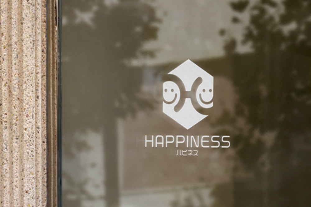 健康な体と心の豊かさを追求する会社「HAPPINESS」のロゴ制作