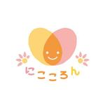 e design (erikko)さんのベビーマッサージ「にこころん」のロゴへの提案