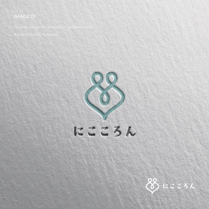 doremi (doremidesign)さんのベビーマッサージ「にこころん」のロゴへの提案
