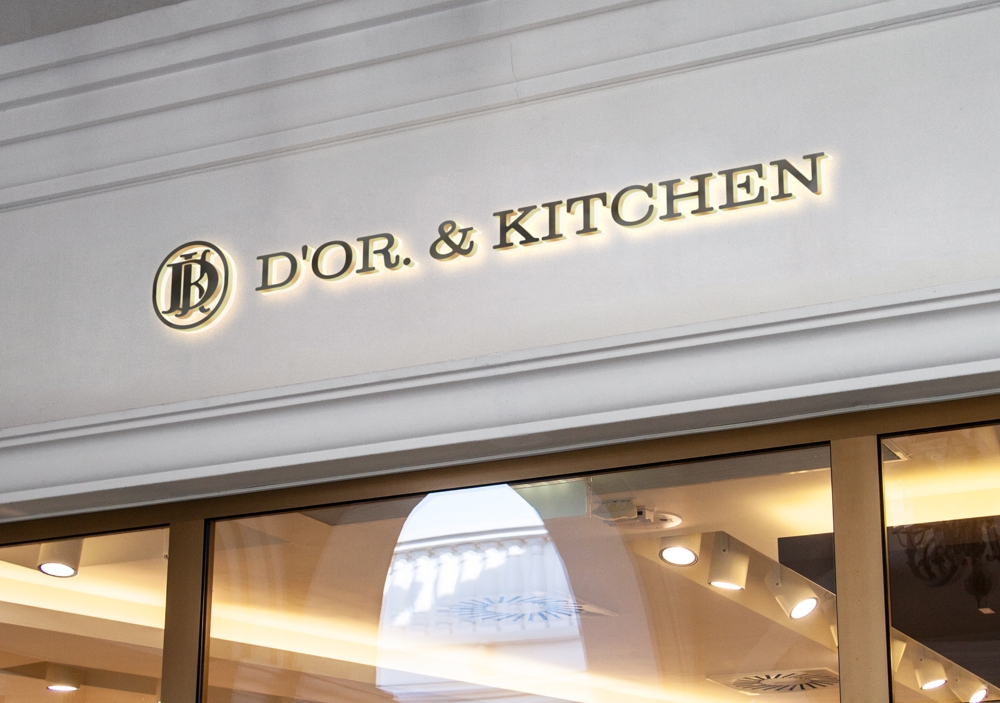 洋菓子店が展開するカフェ『D'OR. & KITCHEN』のロゴ
