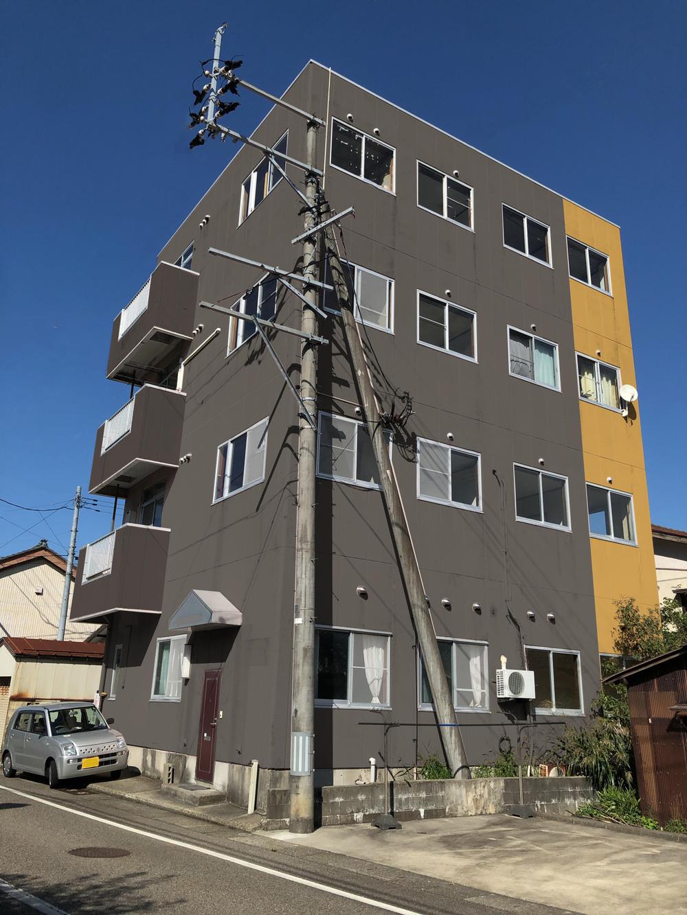 4階建てマンション「Mビル」の外壁塗装デザイン
