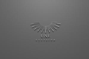 七七七 (hakuji_de)さんのアイサロン『UNE』のロゴへの提案