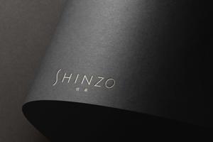 holy245 (holy245)さんの化粧品販売サイト「SHINZO（信蔵）」のロゴへの提案