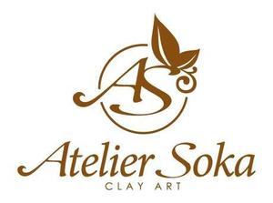 extra (extra)さんのお花やミニチュア雑貨製作を手がけるクレイアート（樹脂粘土）工房のロゴ制作への提案