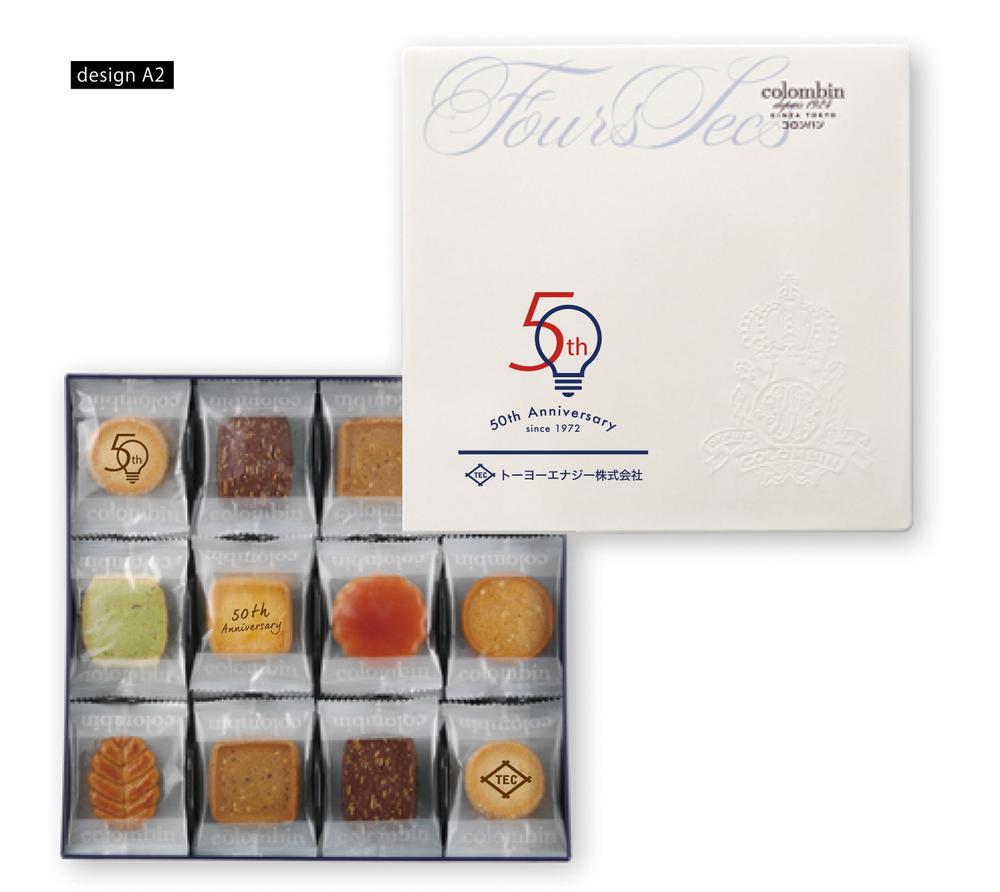 ５０周年記念品のお菓子缶蓋へのデザイン