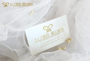 99R+design. (lapislazuli_99)さんの歯科クリニック「リッツ歯科・矯正歯科」のロゴへの提案