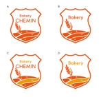 ambrose design (ehirose3110)さんの十勝の畑のそばのパン屋さん「Bakery chemin　岡田屋」のロゴへの提案