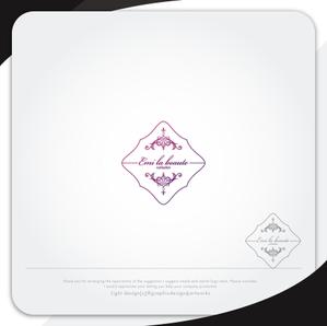XL@グラフィック (ldz530607)さんのネイルサロンの「Emi la beaute」ｴﾐﾗﾎﾞｰﾃのロゴへの提案