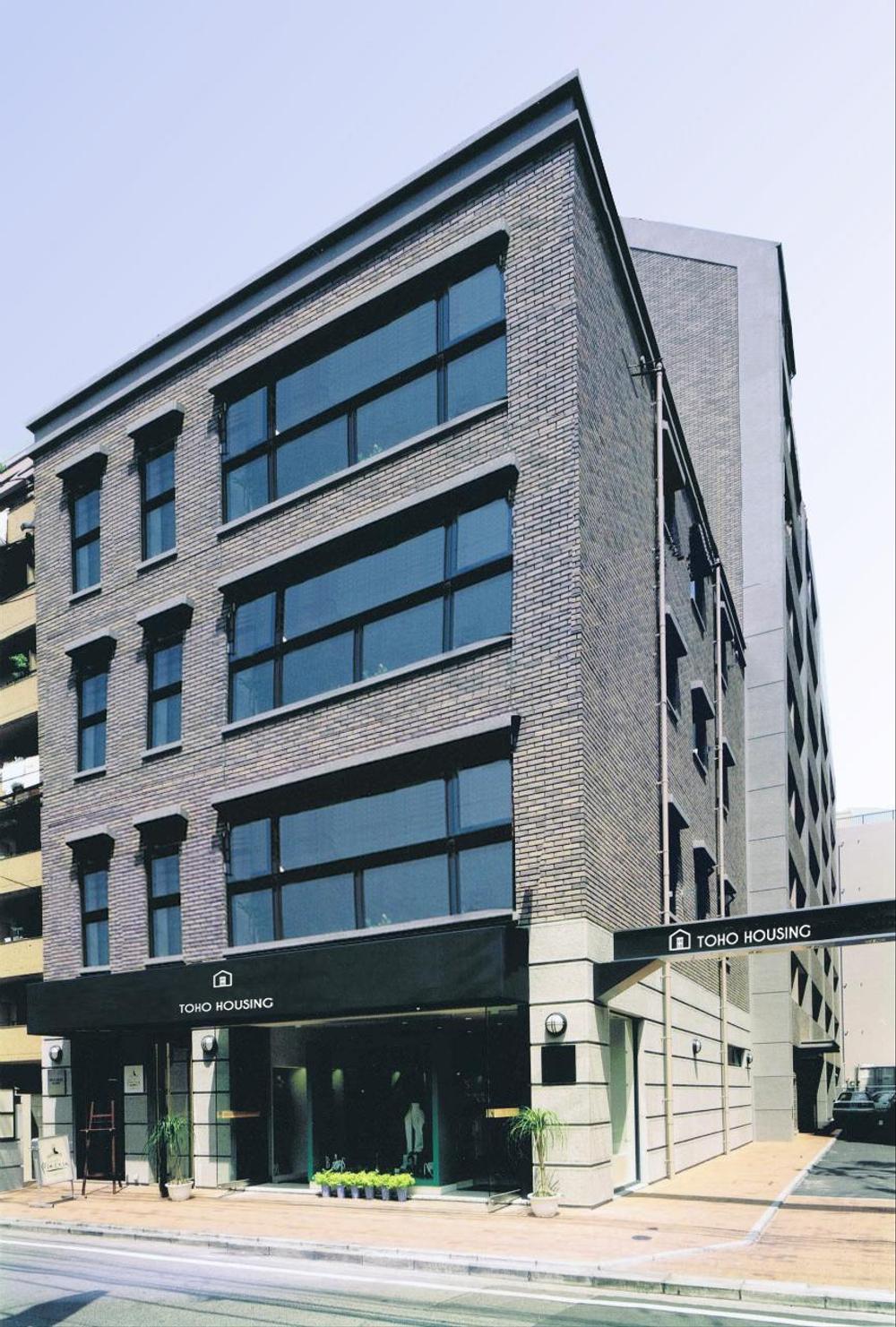 不動産会社「TOHO HOUSING」のロゴ
