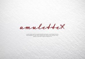 NJONESKYDWS (NJONES)さんの中古ブランド品ショップサイト『amulette』のロゴへの提案