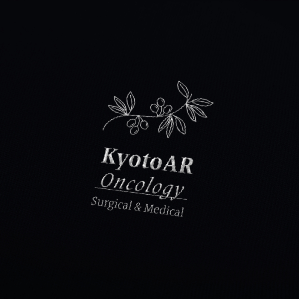KyotoAR動物高度医療センター「腫瘍科スクラブ」の袖と背面のロゴのデザイン