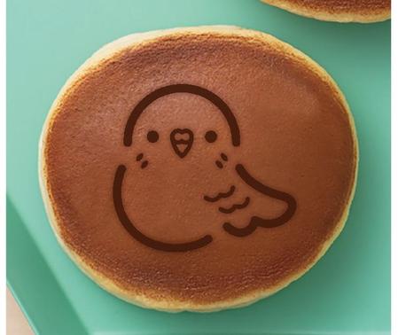 anchor (anc_design)さんのインコの焼印イメージへの提案