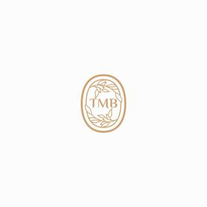 Og Depiction (Oganesson)さんの世界ブランドとして「TEAM MEDICALBROWS」のチームロゴ_TMBへの提案