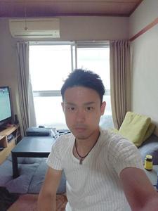 田村 忠晃