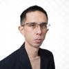 岩田 拓治