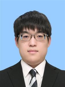 尾越　康弘